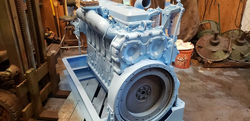 Diesel engine undergoing complete motor reparation at Motor Service Group machine shop in Miami including disassembly inspection and precision machining