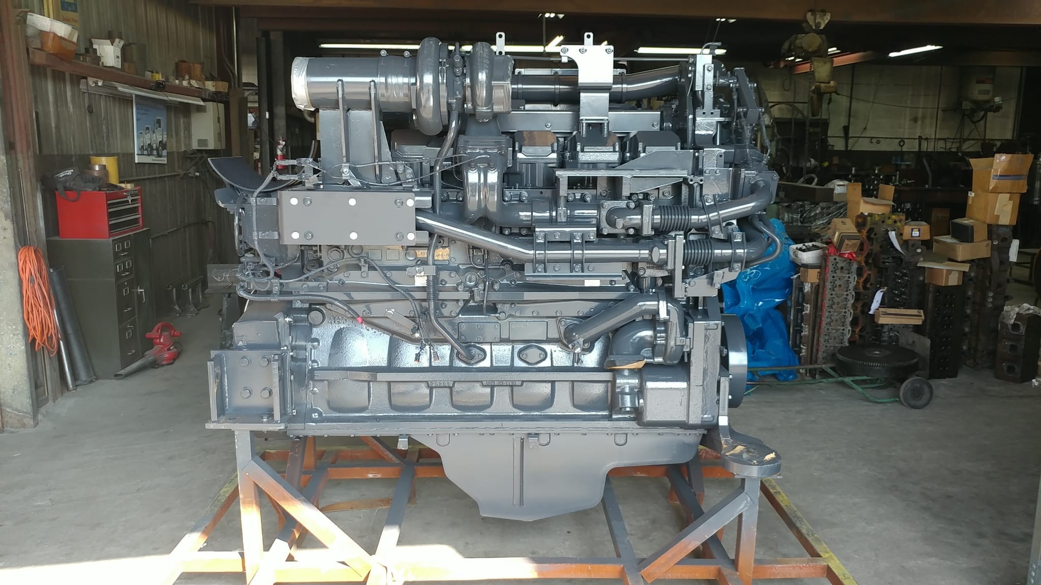 Diesel engine components staged for machining at Motor Service Group shop in Miami showing job queue and turnaround process