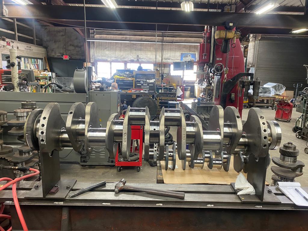 Diesel crankshaft undergoing journal measurement and grinding cost evaluation at Motor Service Group Miami