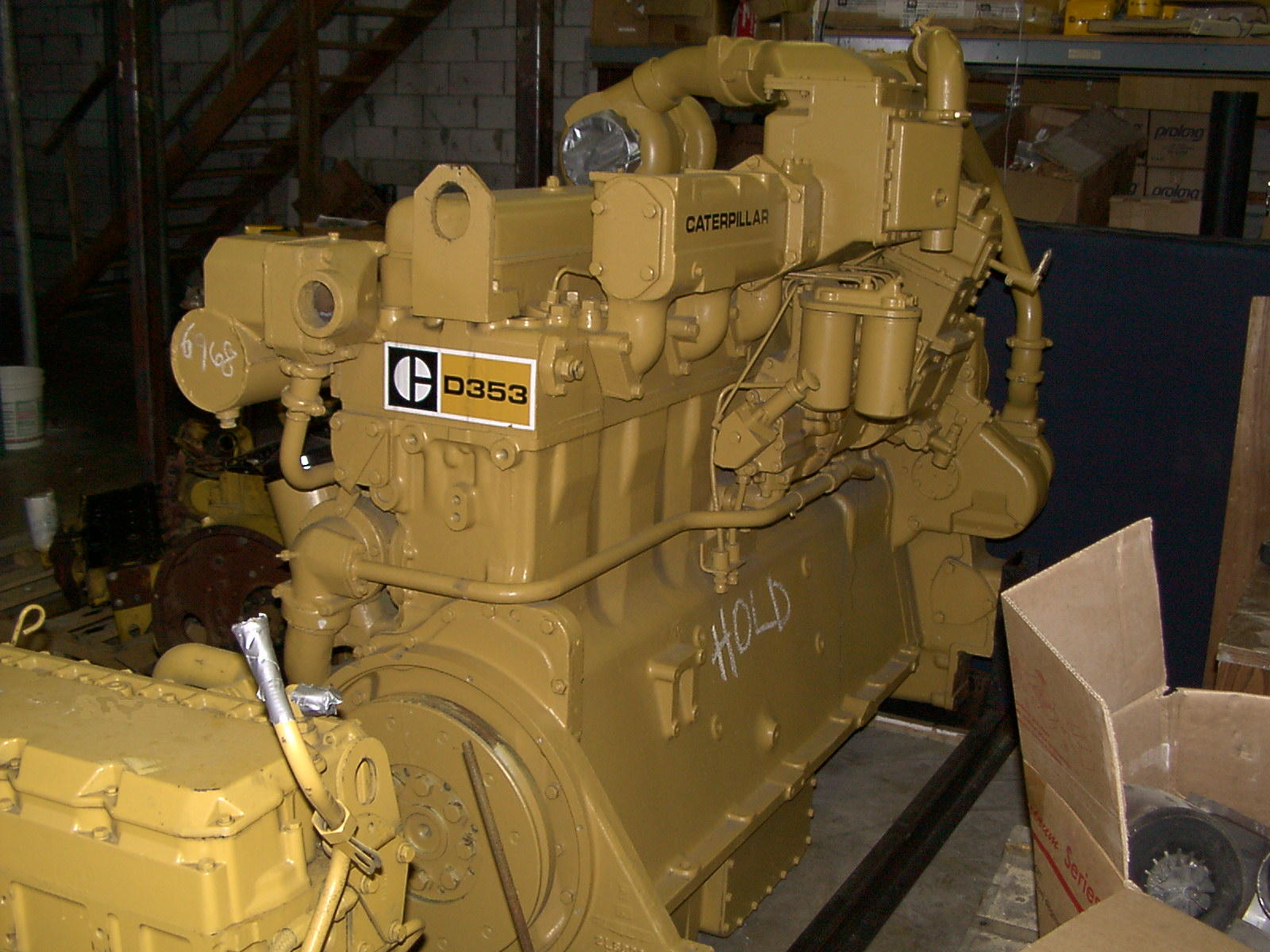Marine diesel cylinder head undergoing corrosion inspection and crack detection at Motor Service Group machine shop in Miami