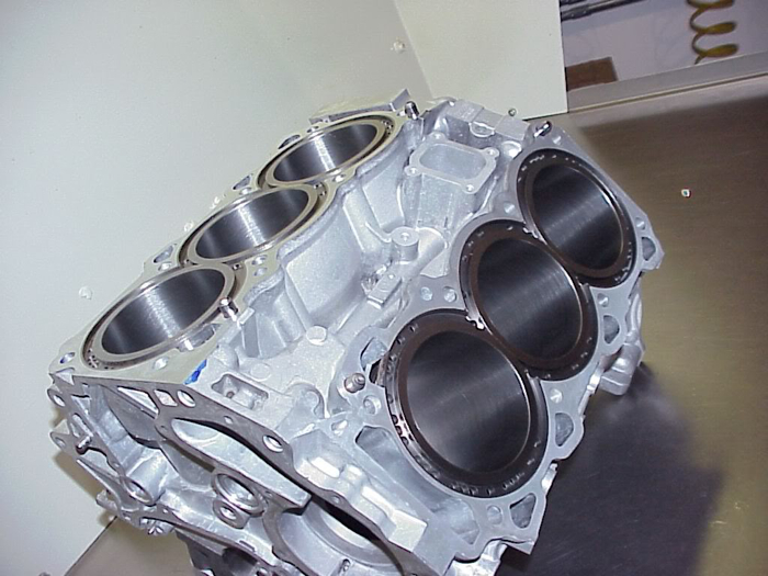 Diesel engine block being bored and honed at Motor Service Group in Miami